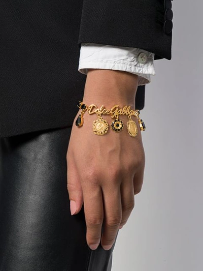 Shop Dolce & Gabbana Logo And Medallions Bracelet In Gold