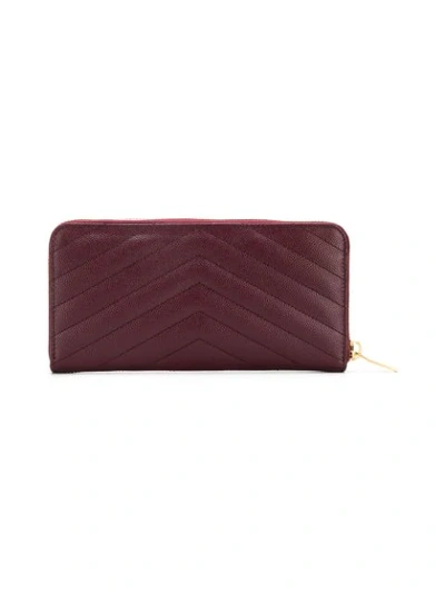 Saint Laurent Monogram Zip Around Wallet In Red