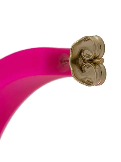 Shop Gcds Embossed Logo Hoop Earrings In Pink