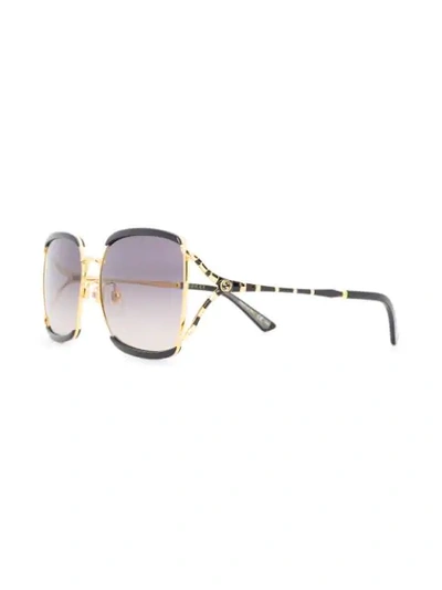 Shop Gucci Stripe Detail Sunglasses In Black
