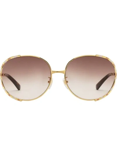 Shop Gucci Runde Sonnenbrille In Gold