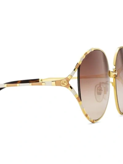 Shop Gucci Runde Sonnenbrille In Gold