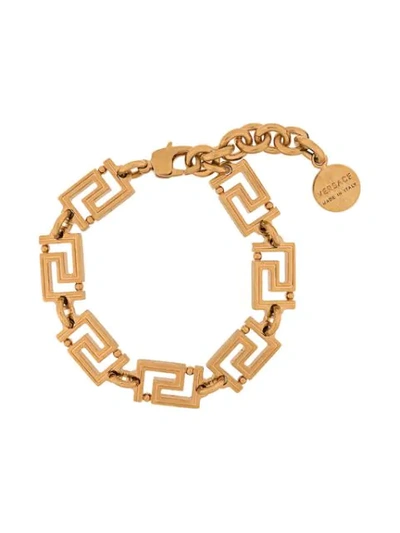 Shop Versace Grecamania Bracelet In Gold