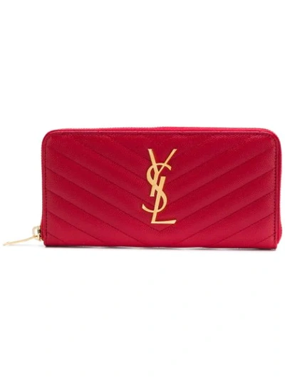 Shop Saint Laurent Monogram Zip-around Wallet In Red