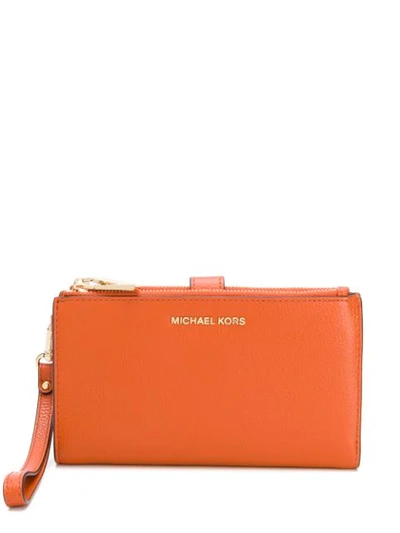 Shop Michael Michael Kors Jet Set Zipped Wallet In Orange