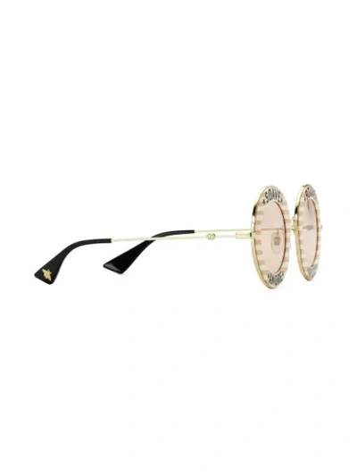 Shop Gucci Round Frame Sunglasses In Gold