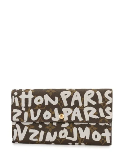 Shop Pre-owned Louis Vuitton Graffiti Print Monogram Wallet In Brown