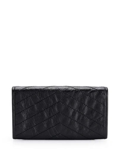 Shop Saint Laurent Large Niki Crinkled Wallet - Schwarz In Black