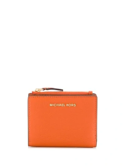 Shop Michael Michael Kors Jet Set Bi-fold Purse In Orange