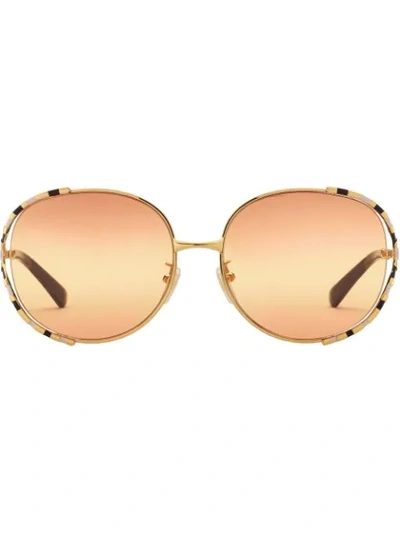 Shop Gucci Runde Sonnenbrille In Gold