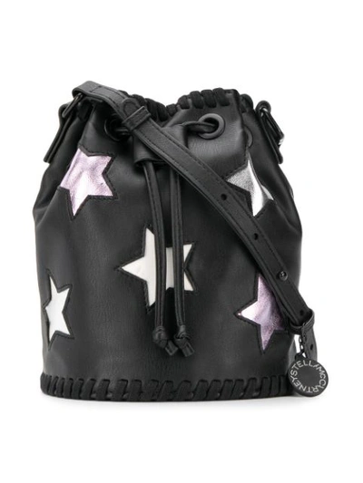 Shop Stella Mccartney Star Print Bucket Bag In Black