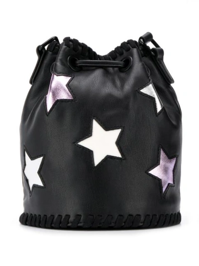 Shop Stella Mccartney Star Print Bucket Bag In Black