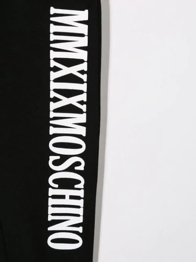 Shop Moschino Jogginghose Mit Print In Black