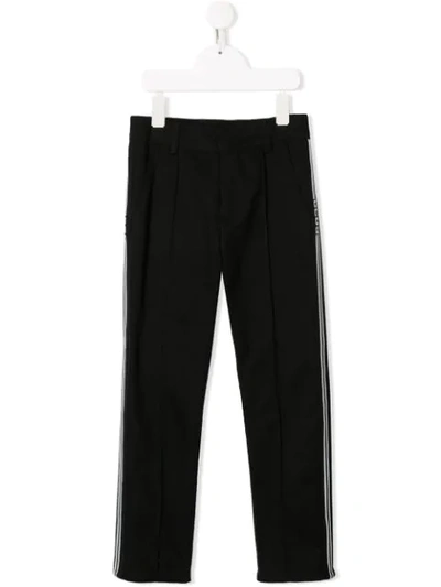 Shop Gcds Stripe Trim Trousers In Black