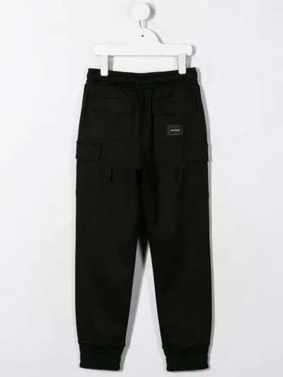 Shop Dolce & Gabbana Branded Track Pants In Black