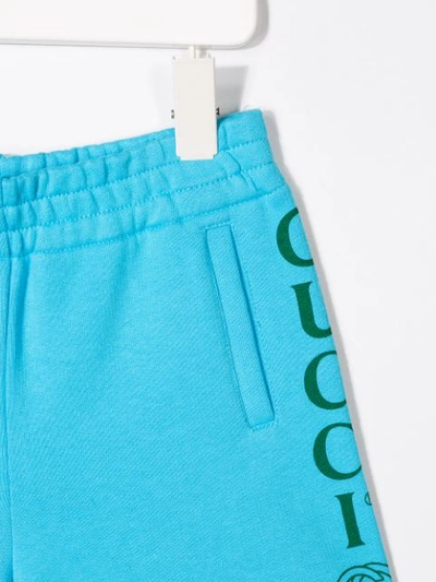 Shop Gucci Logo Print Shorts In Blue