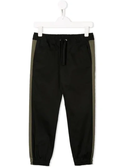 Shop Dolce & Gabbana Contrast Stripe Trousers In Black