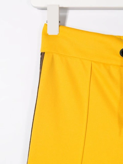 Shop Fendi Teen Logo Appliqué Shorts In Yellow