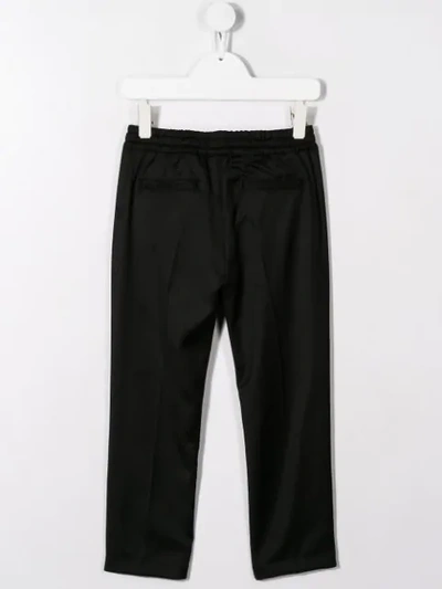 Shop Dolce & Gabbana Elasticated Waistband Slim Trousers In Black