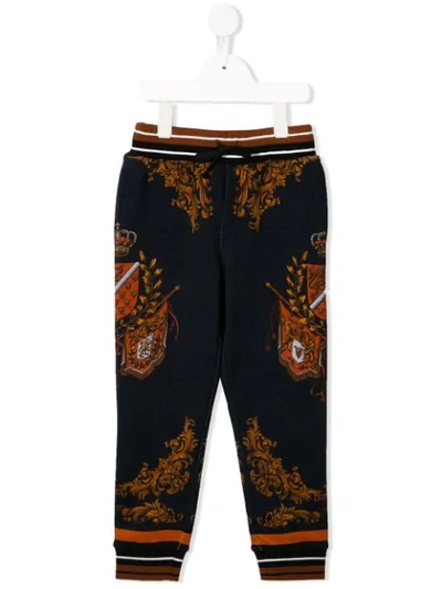 Shop Dolce & Gabbana Cuffed Crest-print Track Pants In Blue