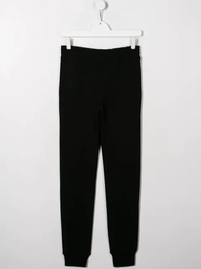 Shop Neil Barrett Teen Logo Print Tracksuit Trousers In Black