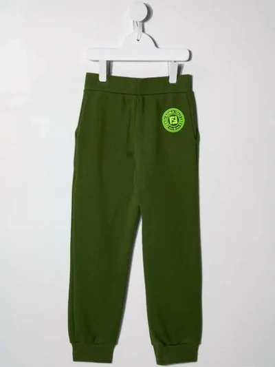 Shop Fendi Logo Printed Track Pants In Green