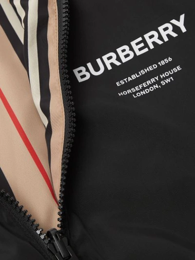 Shop Burberry Reversible Icon Stripe Hooded Jacket In Black