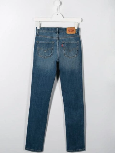 Shop Levi's Stonewashed Jeans In Blue