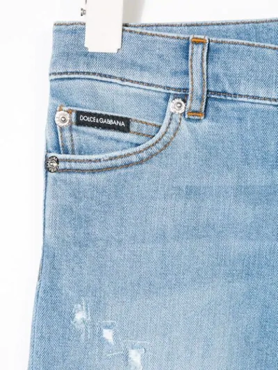 Shop Dolce & Gabbana Washed Distressed Jeans In Blue