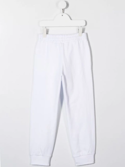 Shop Balmain Tapered Track Pants In White