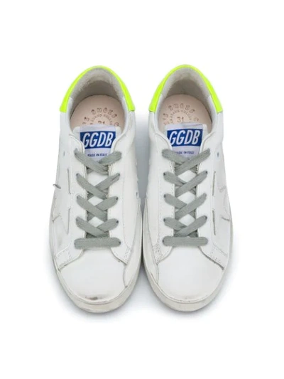 Shop Golden Goose Distressed Low Top Sneakers In White