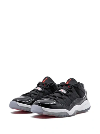 Shop Jordan Low Top  11 Retro Bp Sneakers In Black