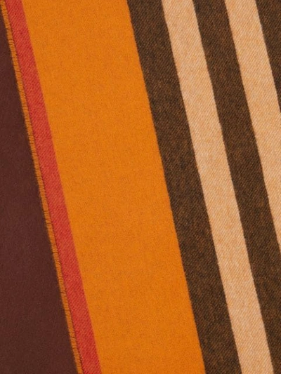 Shop Burberry Reversible Icon Stripe Cashmere Scarf In Orange