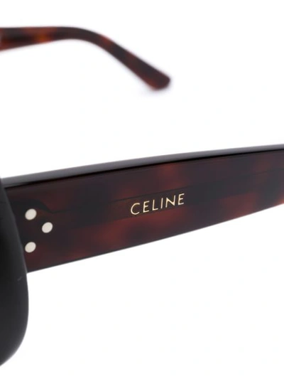 Shop Celine Eyewear Unisex Round Frame Sunglasses - Brown