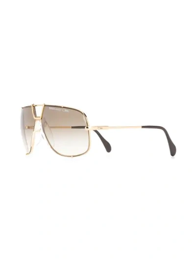 Shop Cazal Aviator Style Sunglasses In Gold