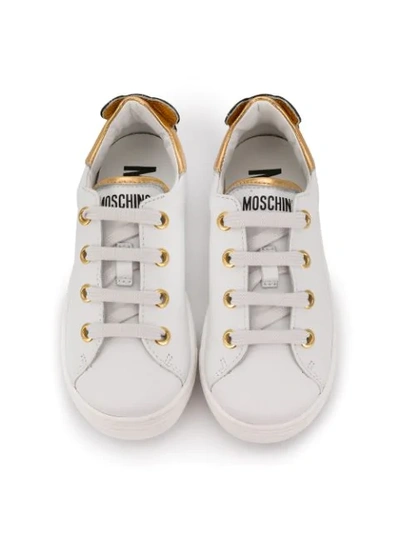 Shop Moschino Lace-up Sneakers In White
