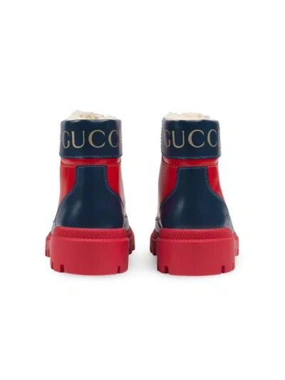 Shop Gucci Front Zip Boots In Red
