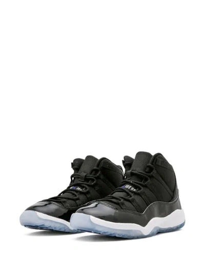 Shop Jordan 11 Retro "space Jam" Sneakers In Black ,white