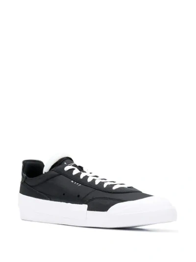 Shop Nike Drop Type Lx Sneakers In Black