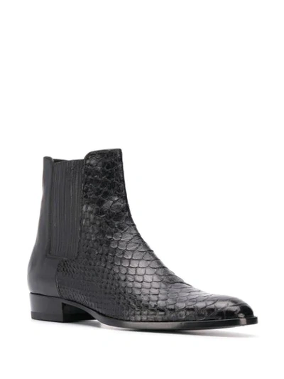 Shop Saint Laurent Wyatt 30mm Ankle Boots In Black