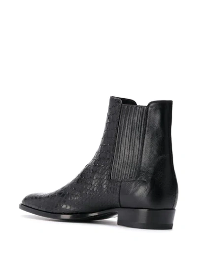 Shop Saint Laurent Wyatt 30mm Ankle Boots In Black