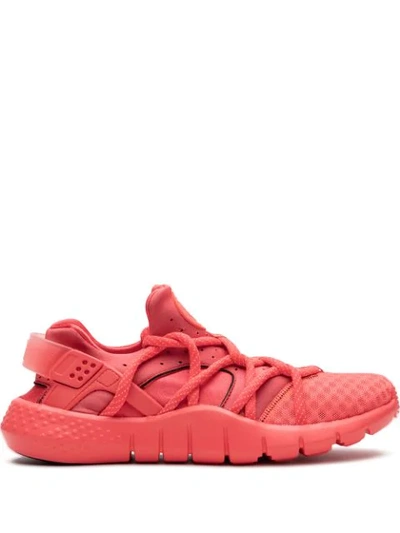 Shop Nike Air Huarache Natural Motion Sneakers In Pink