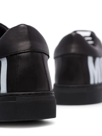 Shop Moschino Side Logo Print Sneakers In 000  Black