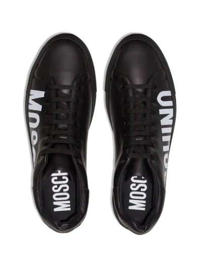 Shop Moschino Side Logo Print Sneakers In 000  Black