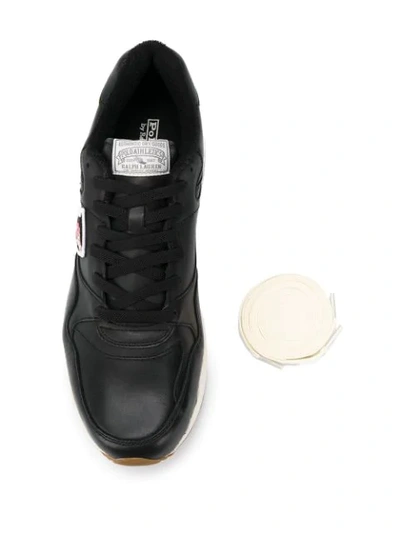 Shop Polo Ralph Lauren Logo Patch Low Top Sneakers In Black