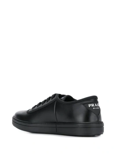 Shop Prada Low-top Lace Up Sneakers In Black