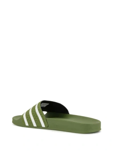 Shop Adidas Originals Adilette Striped Slides In Green