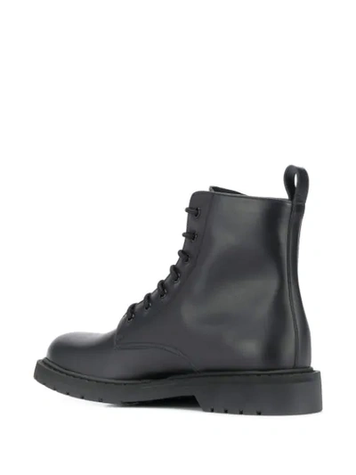 Shop Valentino Vltn Boots In Black