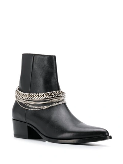 Shop Amiri Stivali Boots In Black