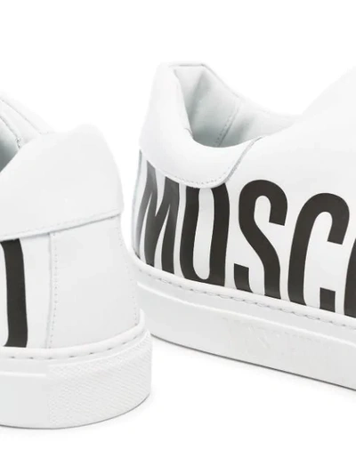 Shop Moschino Side Logo Print Sneakers In White